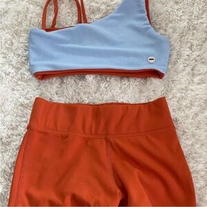 Blue and Orange Asymmetrical Sports Bra and short set Tiger Friday